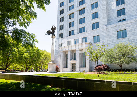 Atlanta, USA - April 20, 2018: Federal Reserve Bank of Atlanta Georgia government building in downtown with eagle statue in park Stock Photo