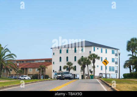Destin, USA - April 24, 2018: Apartment or condominium complex building by beach or ocean in Gulf of Mexico at Miramar beach city town at Gulf of Mexi Stock Photo