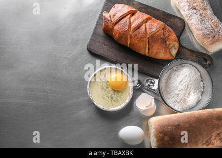 Bakery products with ingredients on table Stock Photo