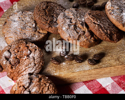 Oatmeal chocolate cookies with coffee grains. Sun flare Stock Photo
