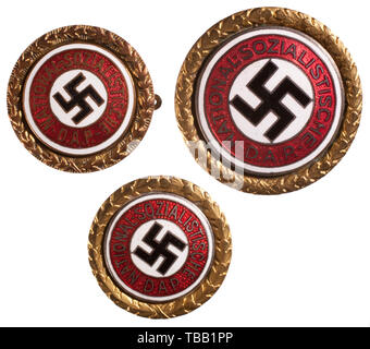 THE JOHN PEPERA COLLECTION, Dr. Jürgen Heigl - a Set of Three Matching Golden Party Badges of the NSDAP, Lightly worn 30 mm gilt Tombak with inset silver-plated, enamelled party badge. Party member number '1302' on lightly worn reverse with stamped 'GES. GESCH.' above horizontal pin on attachment plate stamped 'DESCHLER & SOHN MÜNCHEN 9'. Deschler produced 24 mm of same construction, condition and matching number on reverse with horizontal pin. Unmarked attachment plate. 24 mm of same construction, condition and matching number on reverse with horizontal pin. Attachment pla, Editorial-Use-Only Stock Photo