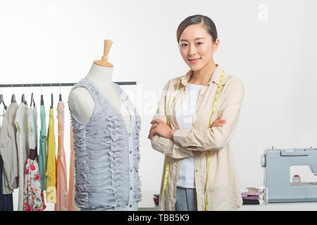 Costume designer designs costumes Stock Photo