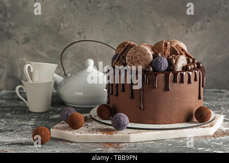 Sweet chocolate cake on table Stock Photo