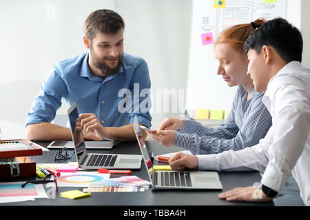 Young IT designers working in office Stock Photo