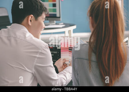Young IT designers working in office Stock Photo