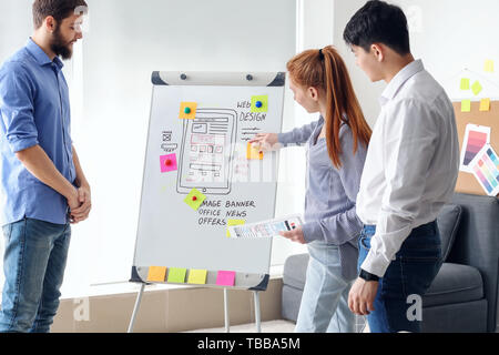 Young IT designers working in office Stock Photo