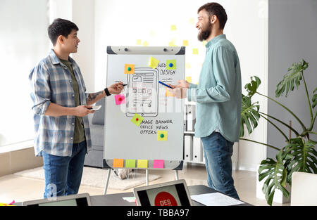 Young IT designers working in office Stock Photo