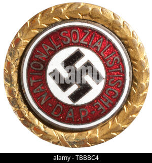 THE JOHN PEPERA COLLECTION, A Golden Party Badge of the NSDAP in 24 mm, Deschler produced gilt Tombak with inset silver-plated, enamelled party badge (light aging). Party member number '92312' on worn reverse with vent hole below horizontal pin., Editorial-Use-Only Stock Photo
