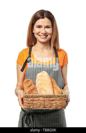 Female baker with bread on white background Stock Photo