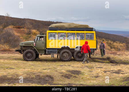 Kamczatka Peninsula, Russia- 30 September 2014: Russian off-road extreme expedition truck with passengers. Duct in the forest into deep Kamchatka. Stock Photo