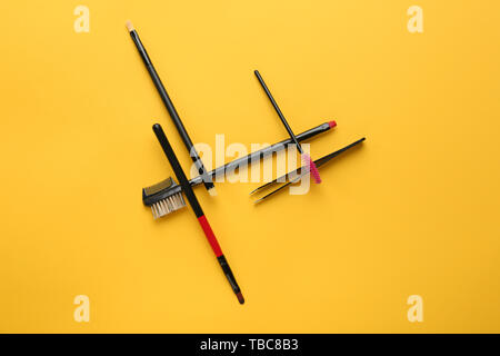 Set of tools for eyebrows correction on color background Stock Photo