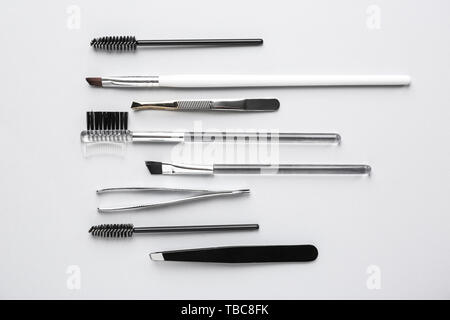 Set of tools for eyebrows correction on white background Stock Photo