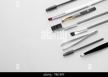 Set of tools for eyebrows correction on white background Stock Photo