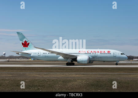 A Air Canada Boeing 787 Dreamliner airplane is seen departing at Montréal-Pierre Elliott Trudeau International Airport in Montreal, Quebec, Canada, on Stock Photo