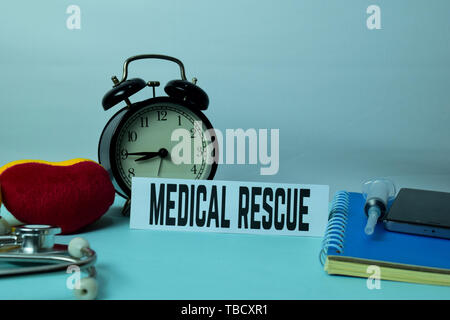 Medical Rescue Planning on Background of Working Table with Office Supplies. Medical and Healthcare Concept Planning on White Background Stock Photo