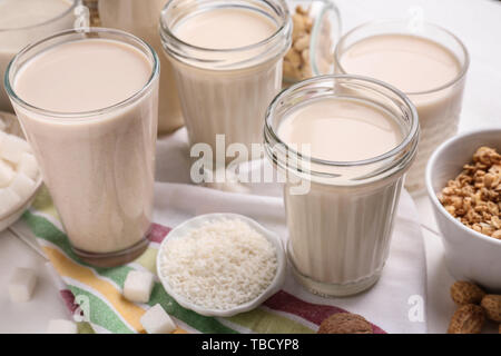 Tasty vegan milk on table Stock Photo