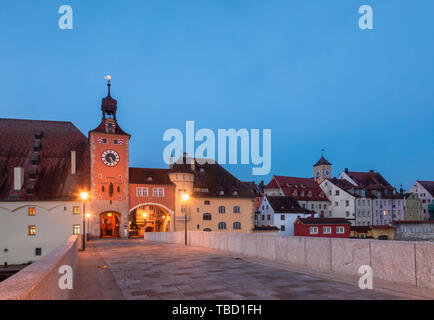 Regensburg cityscape as viewed from the medieval Stone Bridge (Steinerne Brücke) over the Danube river, Bavaria, Germany, Europe. Regensburg in one of Stock Photo