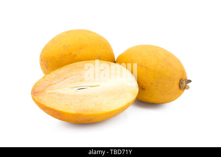 whole and slice of spodilla fruit isolated on white background Stock Photo