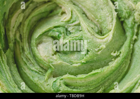 Close up on green cookie dough. Saint Patricks Day and Easter baking concept. Top view, flat lay, copy space. Stock Photo