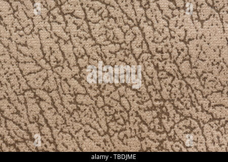 Unusual textile background with mottled surface on light beige colors. High resolution photo. Stock Photo
