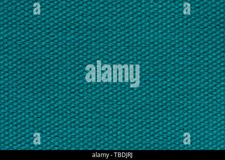 Uncommon textile background in turquoise tone. Blue textile on macro. High resolution photo. Stock Photo