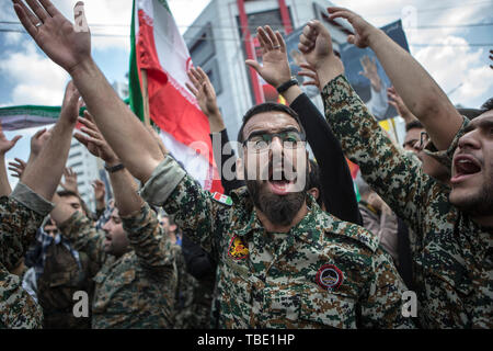 Tehran, Iran. 31st May, 2019. Soldiers shout slogans during a rally to mark the al-Quds (Jerusalem) Day in downtown Tehran, Iran, on May 31, 2019. Hundreds of thousands of Iranians held nationwide rallies in support of the Palestinians to mark the al-Quds Day on Friday. Credit: Ahmad Halabisaz/Xinhua/Alamy Live News Stock Photo