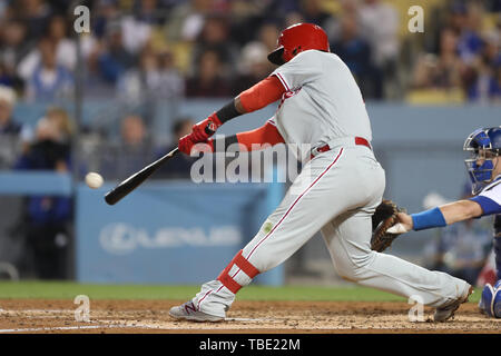 Los Angeles, CA, USA. 31st May, 2019. Philadelphia Phillies shortstop Jean Segura (2) makes contact at the plate during the game between the Philadelphia Phillies and the Los Angeles Dodgers at Dodger Stadium in Los Angeles, CA. (Photo by Peter Joneleit) Credit: csm/Alamy Live News Stock Photo