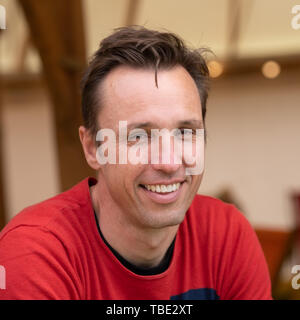 The Hay Festival, Hay on Wye, Wales UK , Saturday 01 June 2019.   Markus Zusak, austrailan writer and novelist  ,  best known for The Book Thief and The Messenger, which became international bestsellers. He won the Margaret A. Edwards Award in 2014 for his contributions to young-adult literature published in the USA. Appearing at the 2019 Hay Festival   The festival, now in its 32nd year, held annually in the small town of Hay on Wye on the Wales - England border,  attracts the finest writers, politicians and intellectuals from  across the globe for 10 days of talks and discussions, celebratin Stock Photo