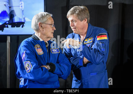 Munich, Germany. 01st June, 2019. Charlie Duke(l), former US astronaut, talks to Ulrich Walter, former scientific astronaut, as part of an event to mark the 50th anniversary of the moon landing at the Deutsches Museum. Duke is one of four people who were on the moon and can still talk about it. Credit: Matthias Balk/dpa/Alamy Live News Stock Photo