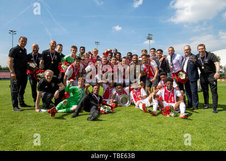 Amsterdam, Netherlands. 01st June, 2019. AMSTERDAM, 01-06-2019, Sportpark de Toekomst, season 2018/2019, Ajax U19 - Feyenoord U19, Ajax U19 Players celebrate the championship Credit: Pro Shots/Alamy Live News Stock Photo