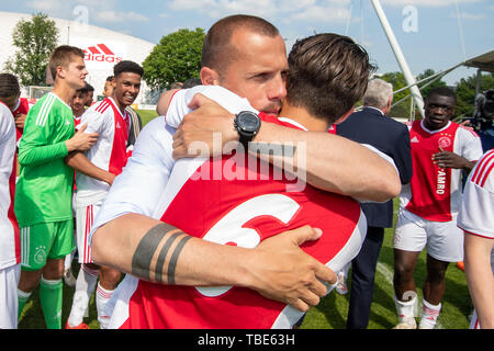 Amsterdam, Netherlands. 01st June, 2019. AMSTERDAM, 01-06-2019, Sportpark de Toekomst, season 2018/2019, Ajax U19 - Feyenoord U19, Ajax U19 coach John Heitinga celebrate the championship Credit: Pro Shots/Alamy Live News Stock Photo