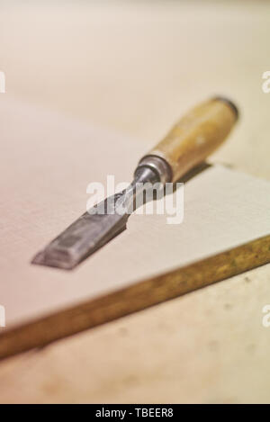 Carpenter chisel in a woodworking workshop Stock Photo