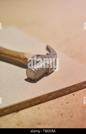 Carpenter hammer in a woodworking workshop Stock Photo