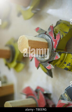 Carpenter saws in a woodworking workshop Stock Photo