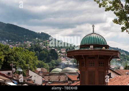 Bosnia and Herzegovina: Bascarsija square, old bazaar, historical and cultural center of Sarajevo with its iconic Sebilj, Ottoman-style wooden fountain Stock Photo