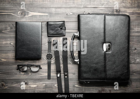 Set of male accessories on wooden background Stock Photo