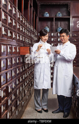 A pharmacist who works at a drugstore. Stock Photo