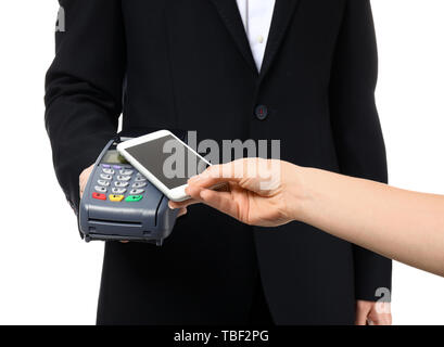 Waiter with terminal and woman paying for order on white background Stock Photo