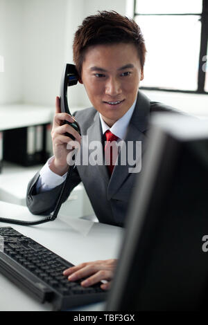 A manager works in an office. Stock Photo