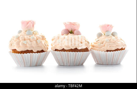 Tasty Easter cupcakes on white background Stock Photo