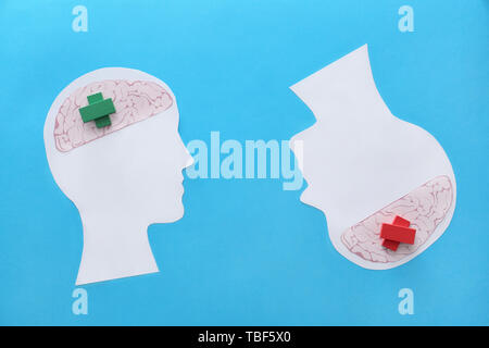 Human heads with blocks on color background. Concept of brain disorders