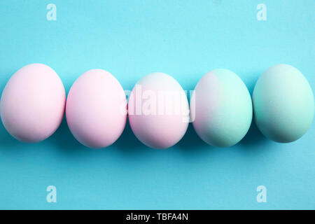 Beautiful Easter eggs on color background Stock Photo