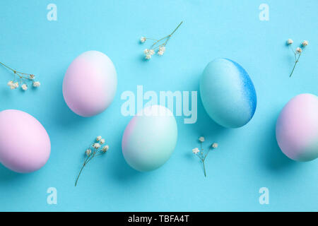 Beautiful Easter eggs on color background Stock Photo