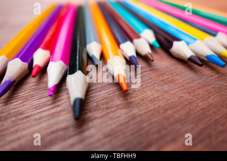 A neatly arranged colored pencil on the table. Stock Photo