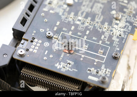 Closeup view of damaged graphic adapter burnt out Stock Photo