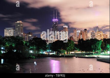 Chicago city urban skyscraper at night over lake viewed from Lincoln Park. Stock Photo