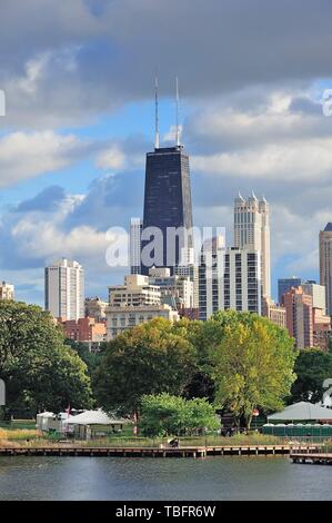 Chicago skyline with skyscrapers viewed from Lincoln Park over lake. Stock Photo