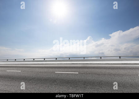 Empty road with blue cloudsky Stock Photo