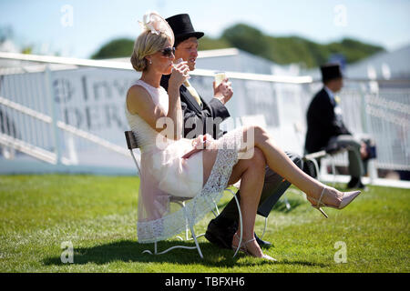 Racegoers enjoy the atmosphere during Derby Day of the 2019 Investec Derby Festival at Epsom Racecourse, Epsom. Stock Photo