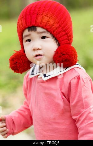 Daughter on outing with mother in park Stock Photo